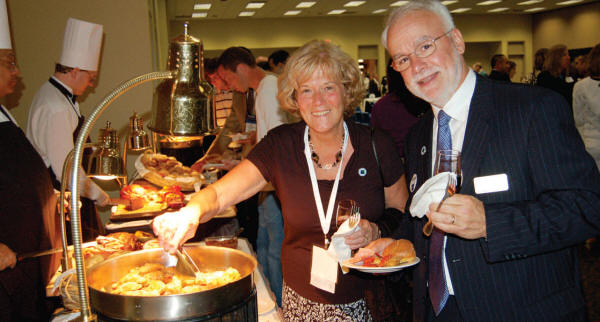 Incoming Foundation Vice President Charlie Redmond, MSEd, ATC, PT, and his wife, Linda, enjoy the spread at the Foundations inaugural donor reception Tuesday night, where President Mark Hoffman, PhD, ATC, announced the first $600,000 in cash and pledges has been secured for the capital campaign now underway. The reception highlighted 16 individuals and groups that have given $5,000 or more to the Foundations research and education initiatives.